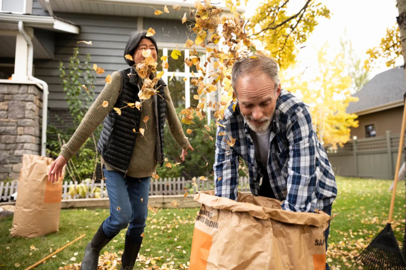 two healthy adults in the backyard