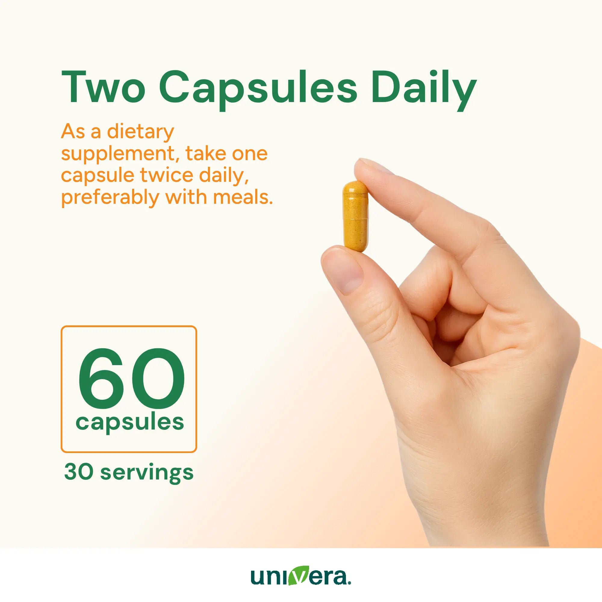 Hand holding a capsule with dietary supplement information on a white background